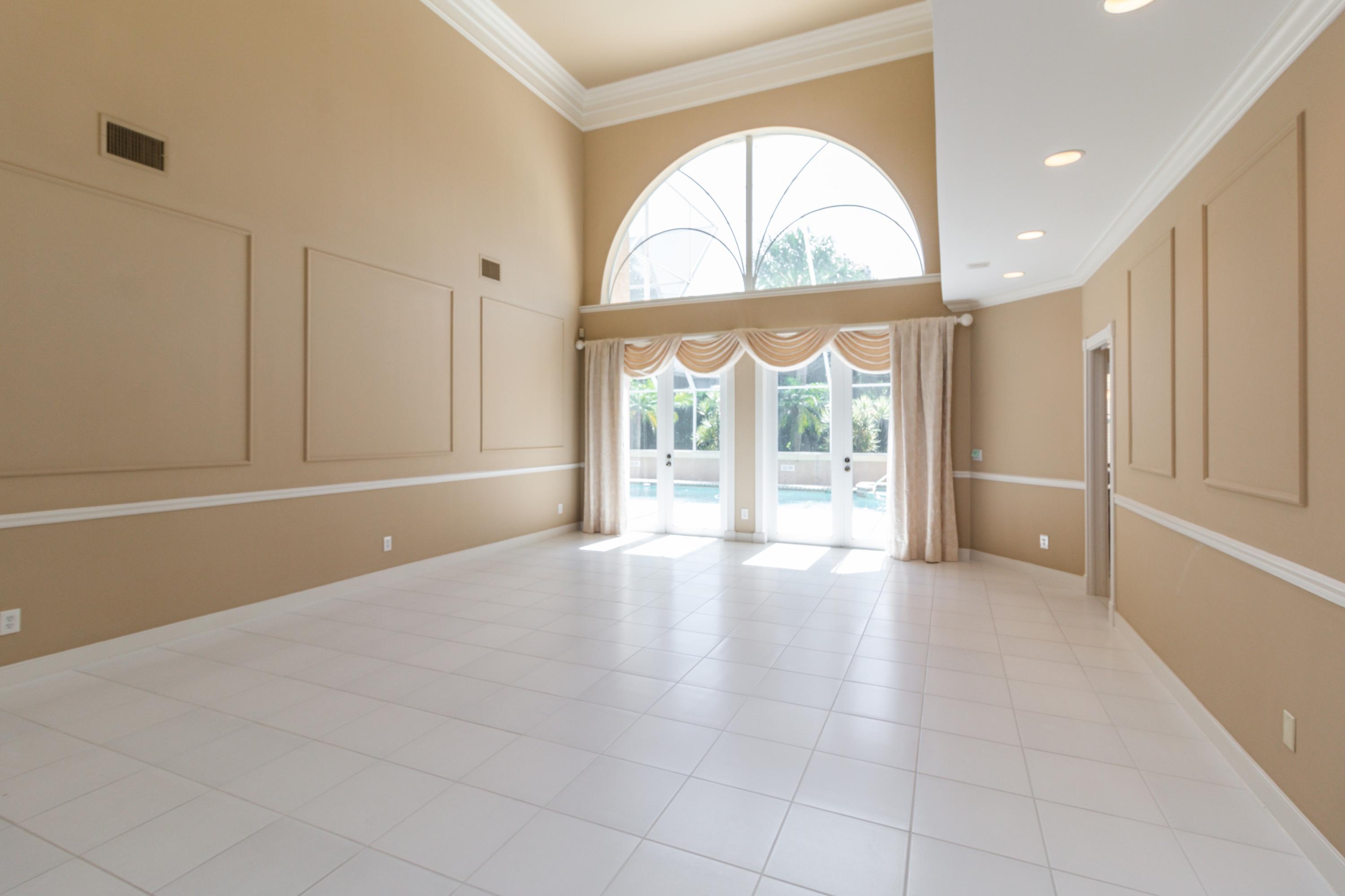 36 West High Point Road Sewall's Point, FL 34996 - Photo 5 of 31 05_36WHighPointRd_165_LivingRoom_HiRes