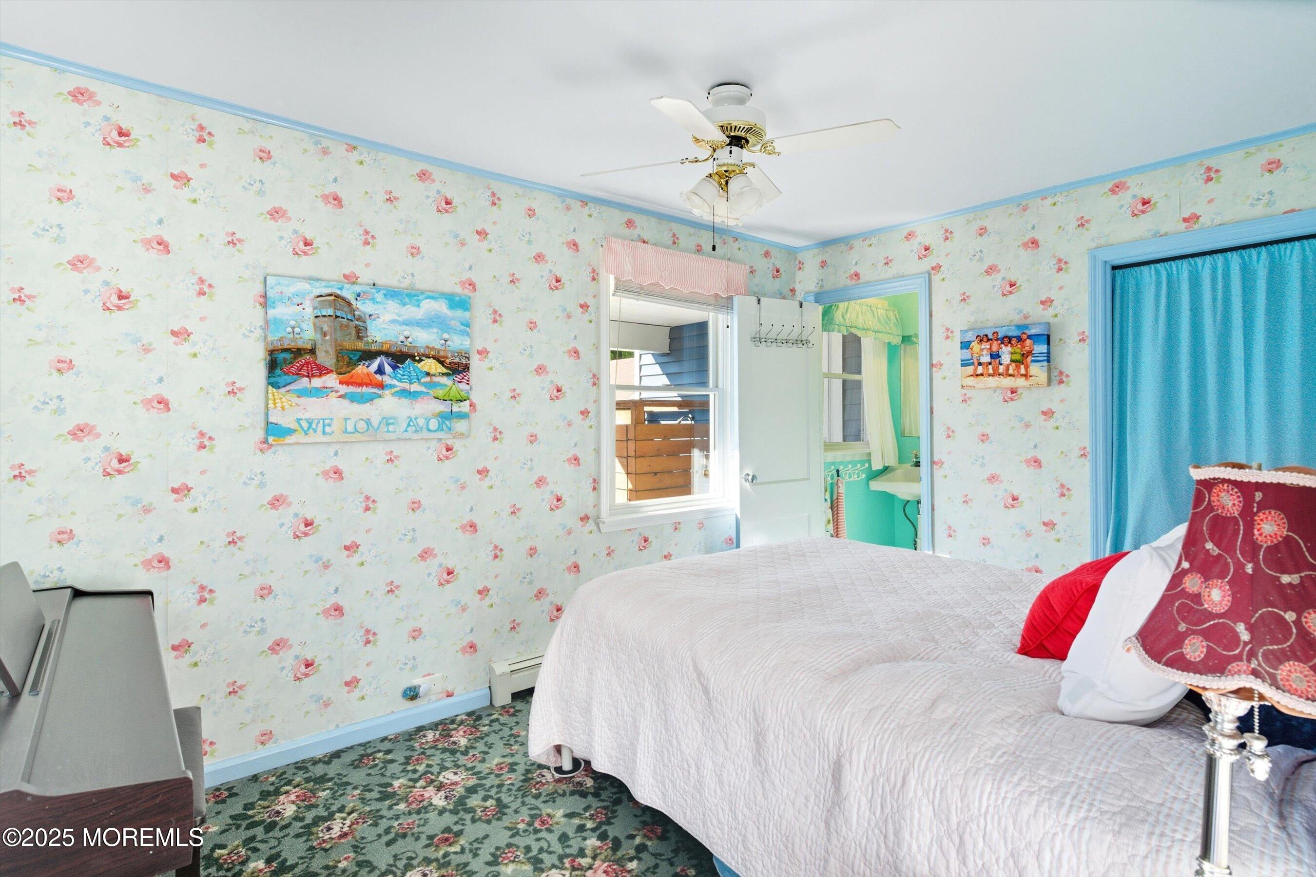 425 Washington Avenue Avon-by-the-Sea, NJ 07717 - Photo 19 of 41 a bedroom with a bed and a dresser in it