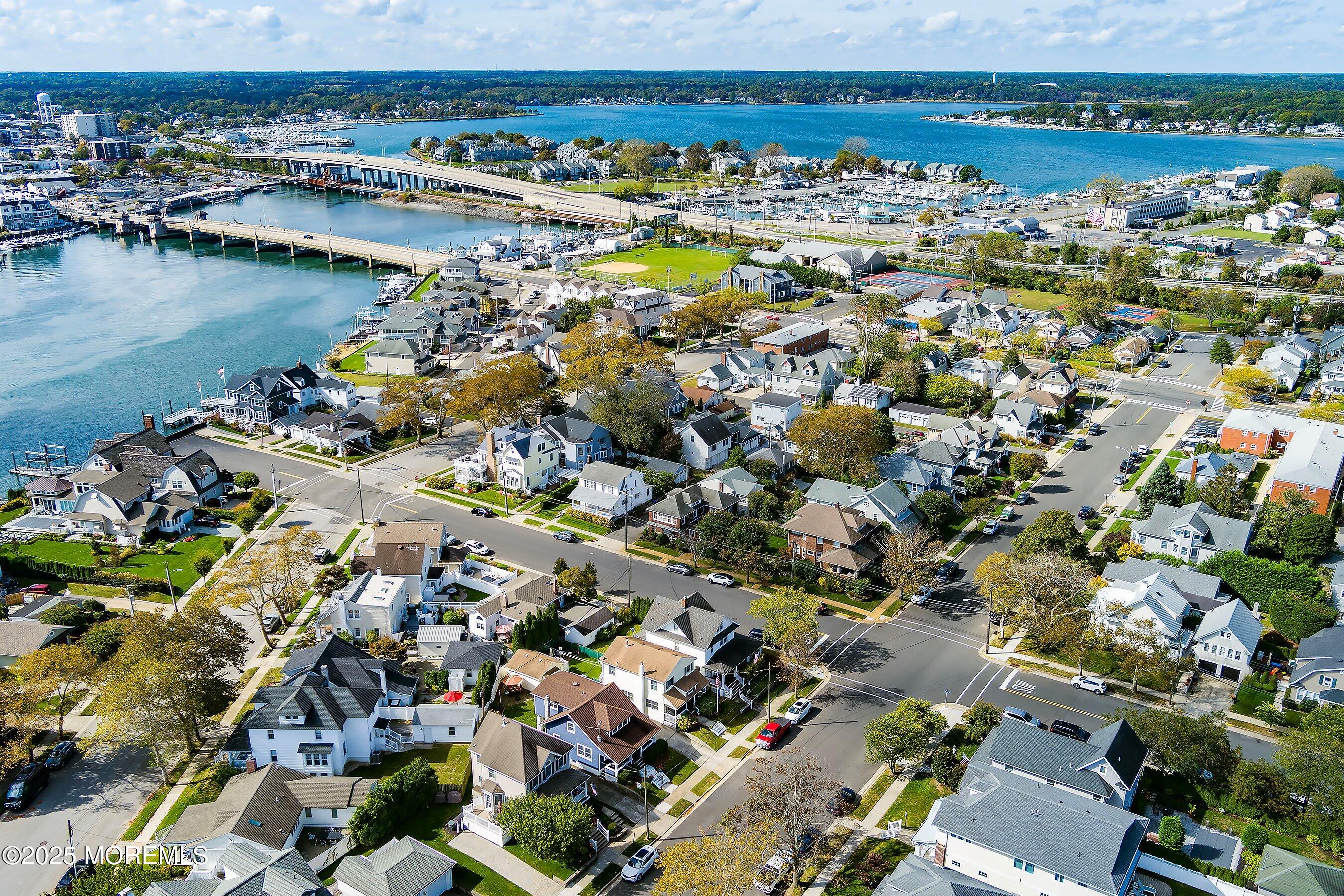 425 Washington Avenue Avon-by-the-Sea, NJ 07717 - Photo 2 of 41 an aerial view of a city with ocean view