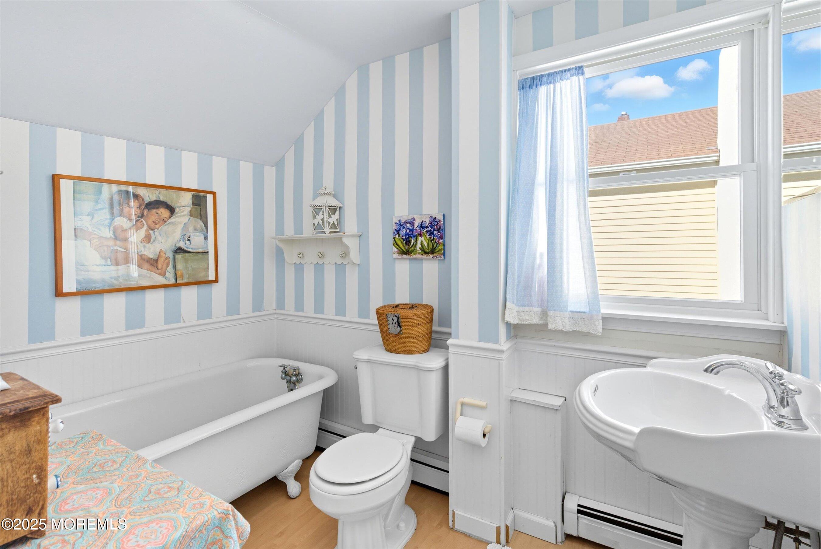 425 Washington Avenue Avon-by-the-Sea, NJ 07717 - Photo 27 of 41 a bathroom with a sink a toilet and a bathtub