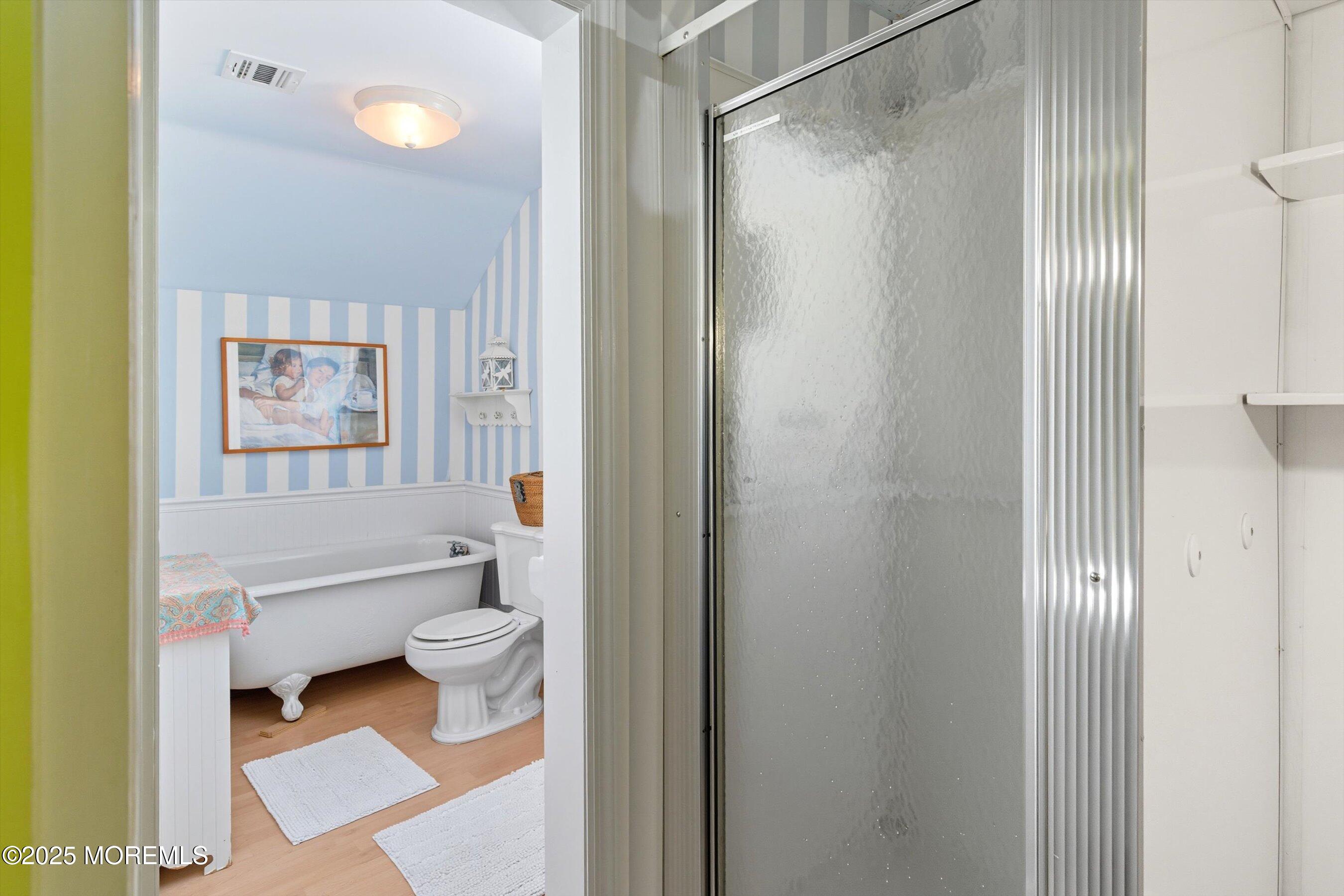 425 Washington Avenue Avon-by-the-Sea, NJ 07717 - Photo 28 of 41 a bathroom with a toilet a sink and a bathtub