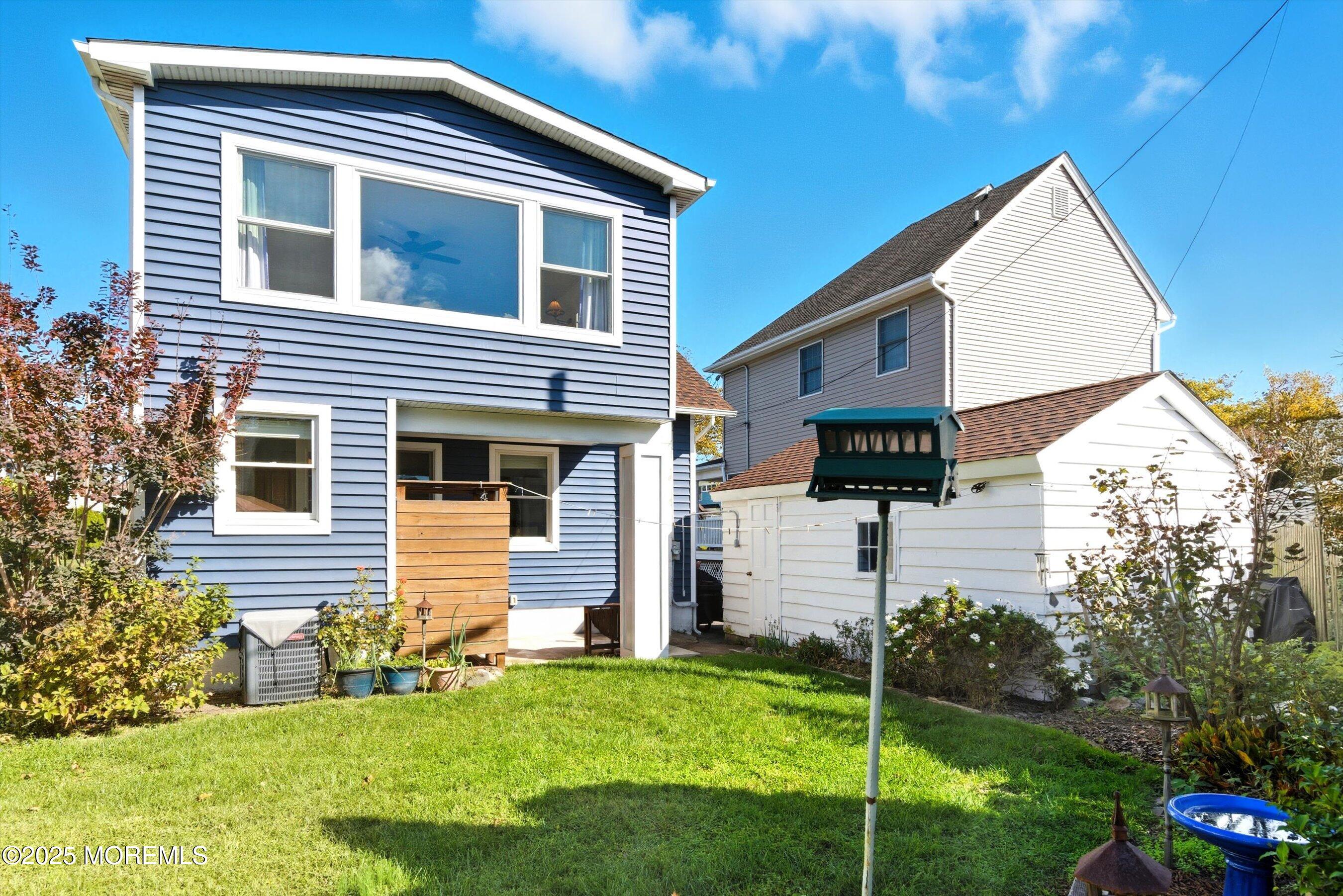 425 Washington Avenue Avon-by-the-Sea, NJ 07717 - Photo 35 of 41 a front view of house with yard