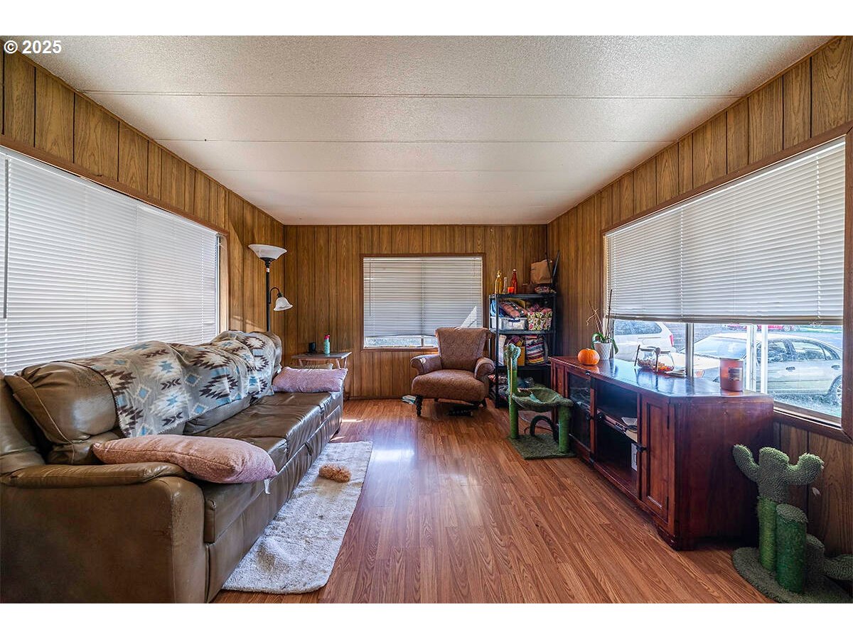 166 Reager Street Medford, OR 97501 - Photo 36 of 43 a living room with furniture and a wooden floor