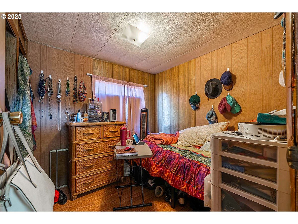 166 Reager Street Medford, OR 97501 - Photo 38 of 43 a bed room with a bed and a window