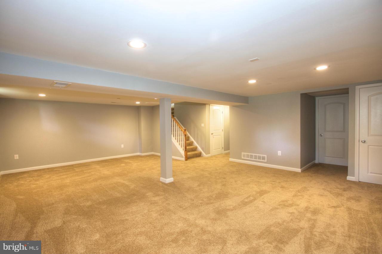 9015 Samoset Road Randallstown, MD 21133 - Photo 22 of 29 an empty room with a natural light and window