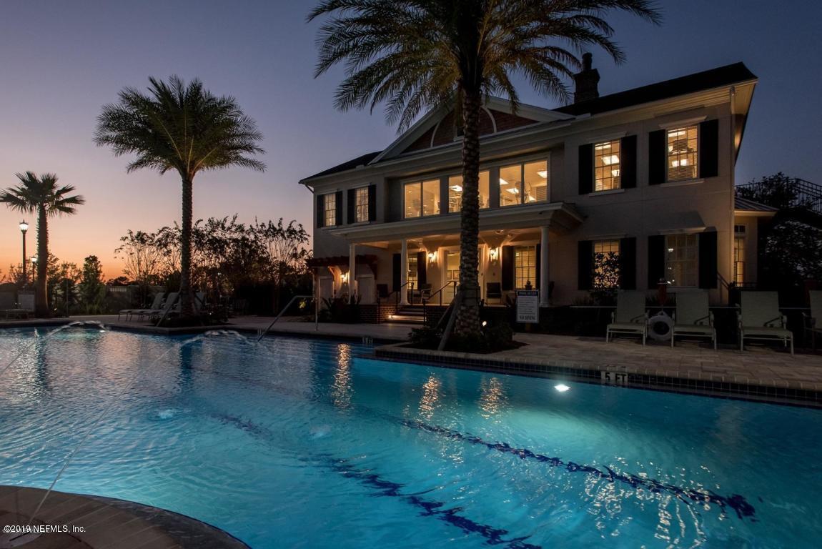 152 Oleta Way St. Augustine, FL 32095 - Photo 6 of 7 a front view of a house with swimming pool and ocean view