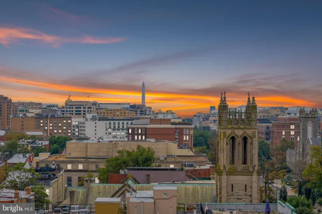 a view of a city with tall buildings