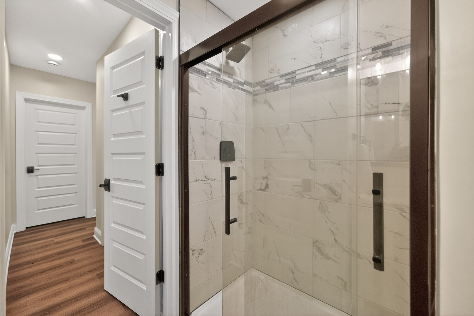 305 West Exchange Street, Unit A Sycamore, IL 60178 - Photo 15 of 27 a bathroom with a shower