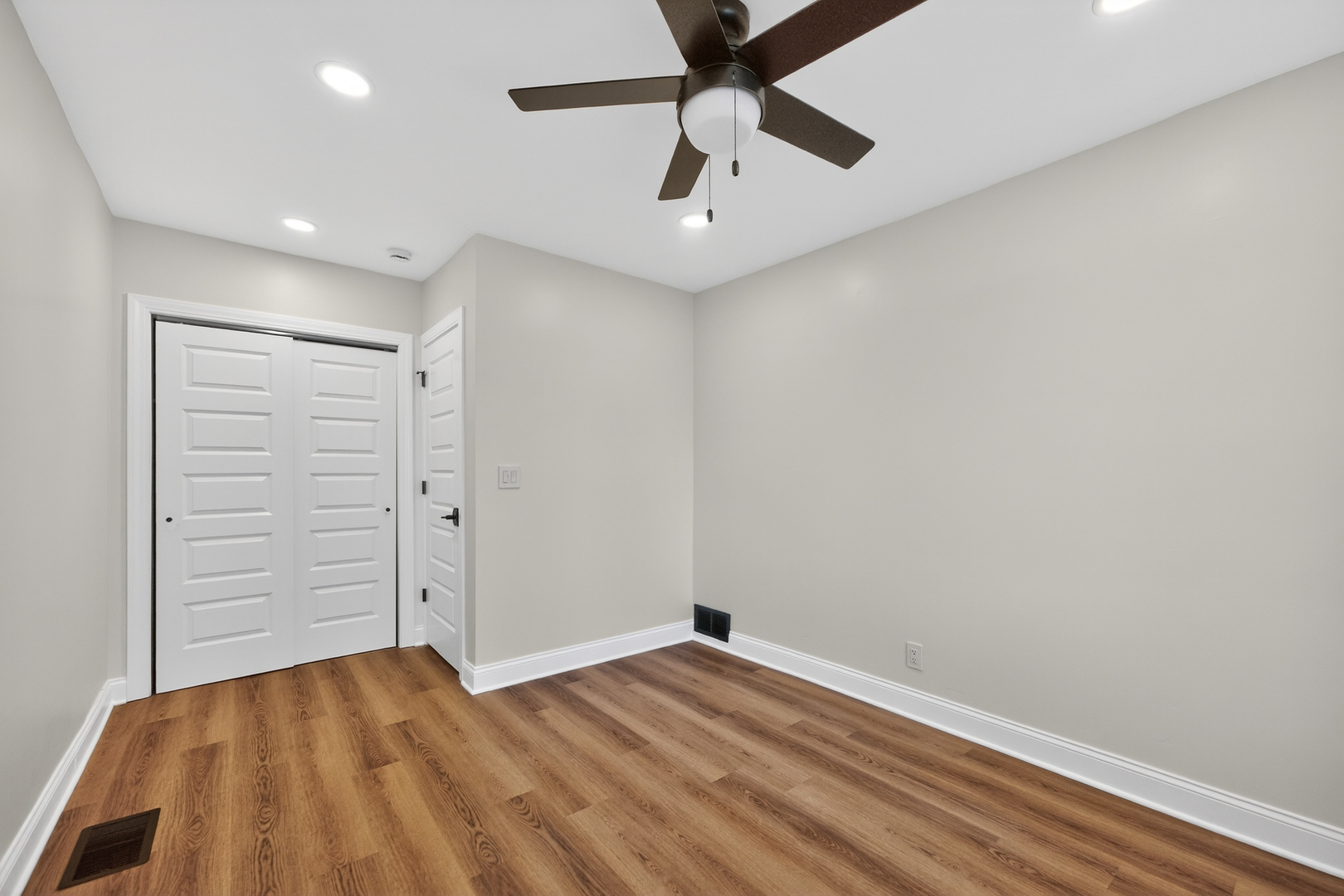 305 West Exchange Street, Unit A Sycamore, IL 60178 - Photo 19 of 27 a view of empty room with wooden floor