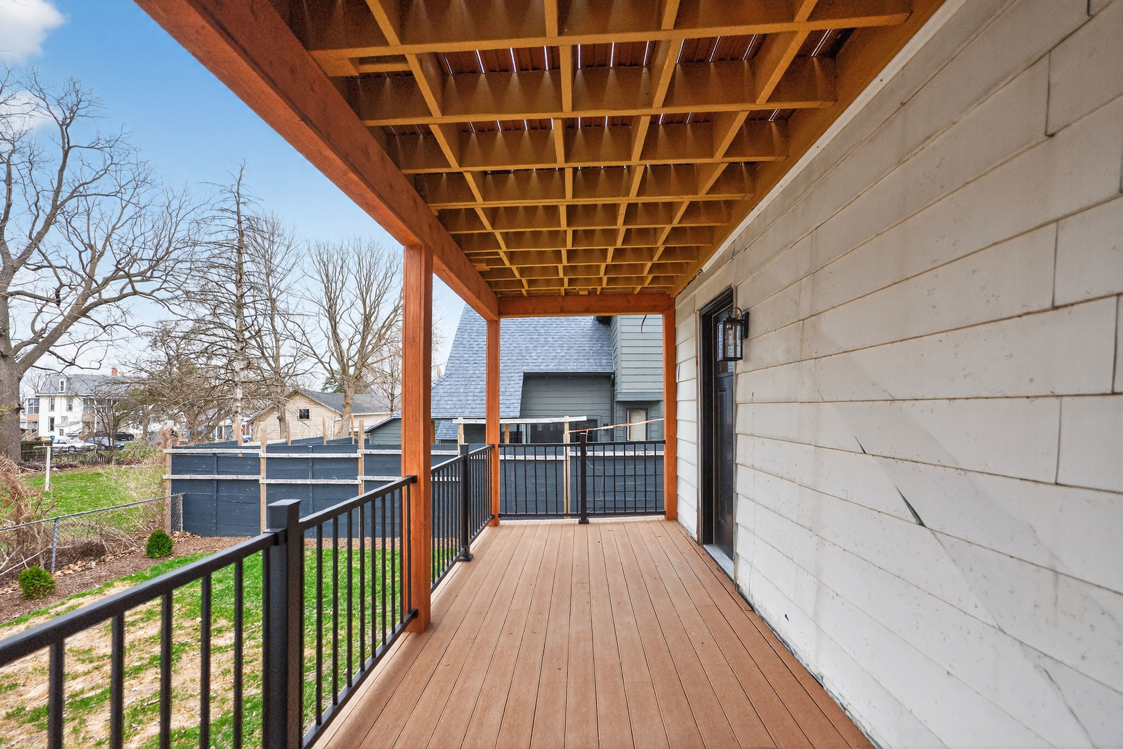 305 West Exchange Street, Unit A Sycamore, IL 60178 - Photo 22 of 27 a view of a porch with wooden floor and electric appliances