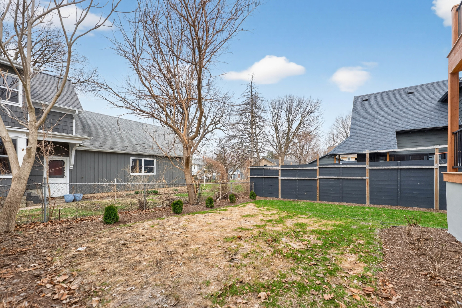 305 West Exchange Street, Unit A Sycamore, IL 60178 - Photo 24 of 27 a house that has a tree in front of it