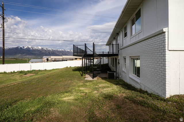 4155 Johnson Road Nibley, UT 84321 - Photo 50 of 71 View of yard featuring a patio and a deck with mountain view