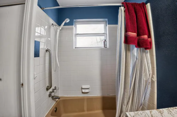 a bathroom with a bathtub