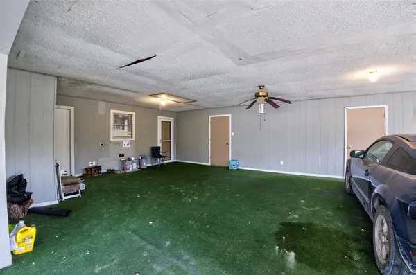 a view of a livingroom with furniture and toys