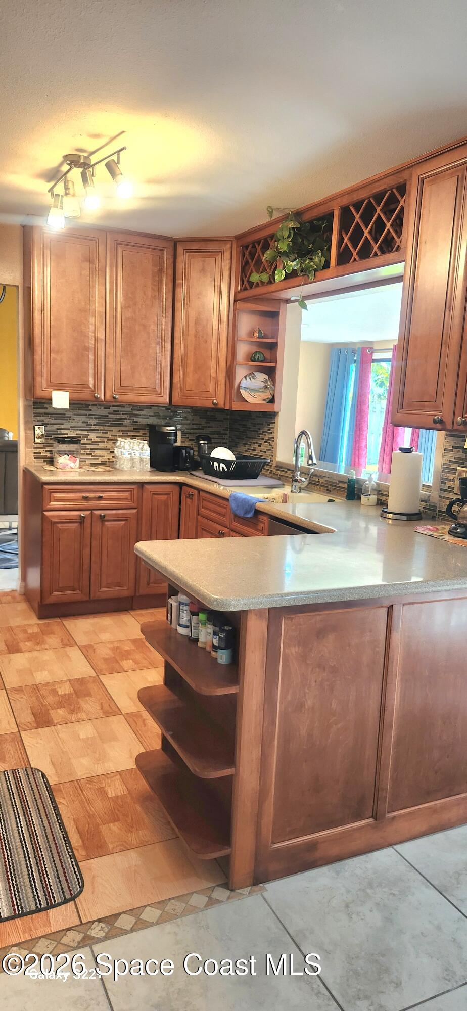 1327 Cherry Hills Road Northeast Palm Bay, FL 32905 - Photo 10 of 20 1327 cherry hills kitchen view