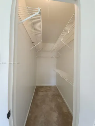 a view of hallway with stairs