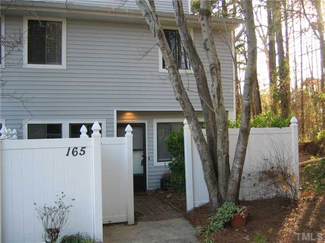 165 Newton Road Raleigh, NC 27615 - Photo 1 of 10 a front view of a house with a tree