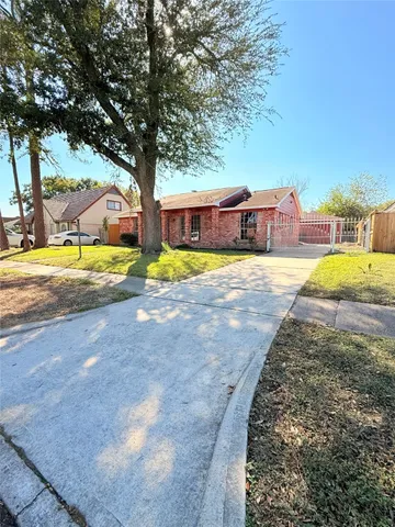 a front view of a house with a swimming pool