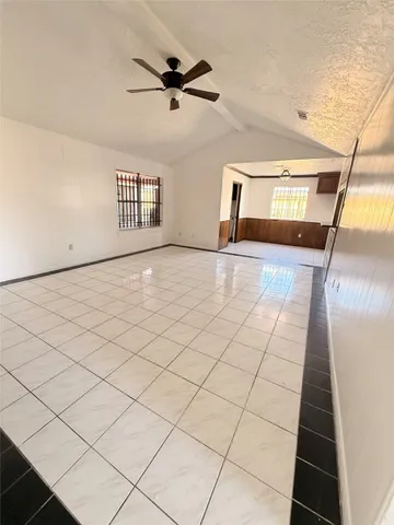 a view of a hall with the floor