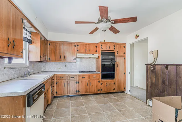 a view of a bedroom with furniture