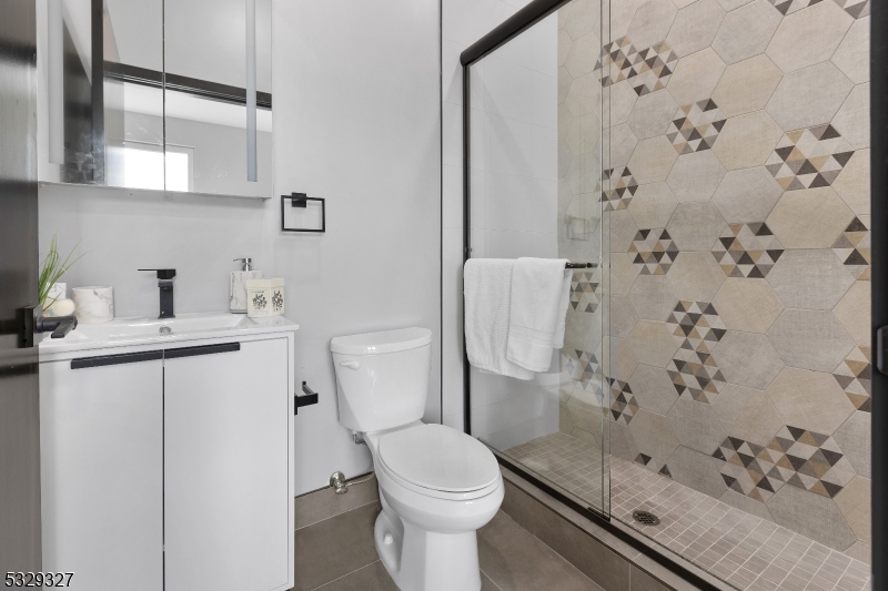 1369 South Avenue, Unit 5 Plainfield, NJ 07062 - Photo 11 of 11 a bathroom with a sink toilet and shower