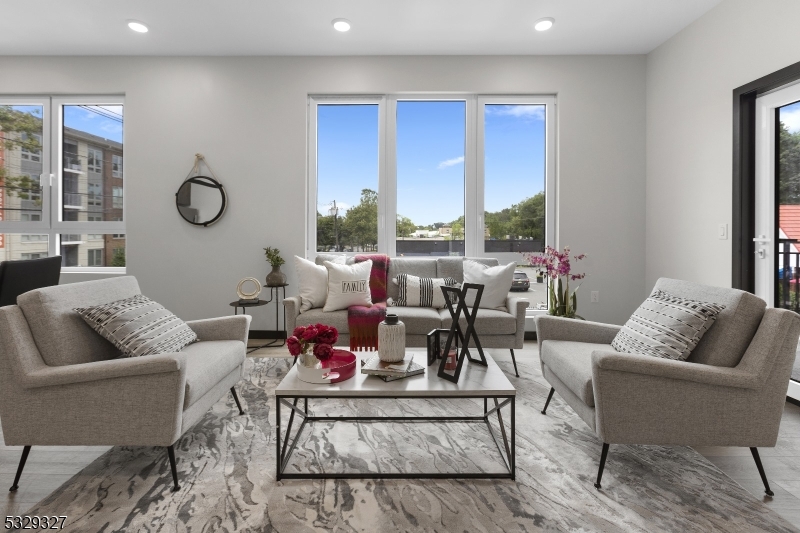 1369 South Avenue, Unit 5 Plainfield, NJ 07062 - Photo 5 of 11 a living room with furniture fireplace and window