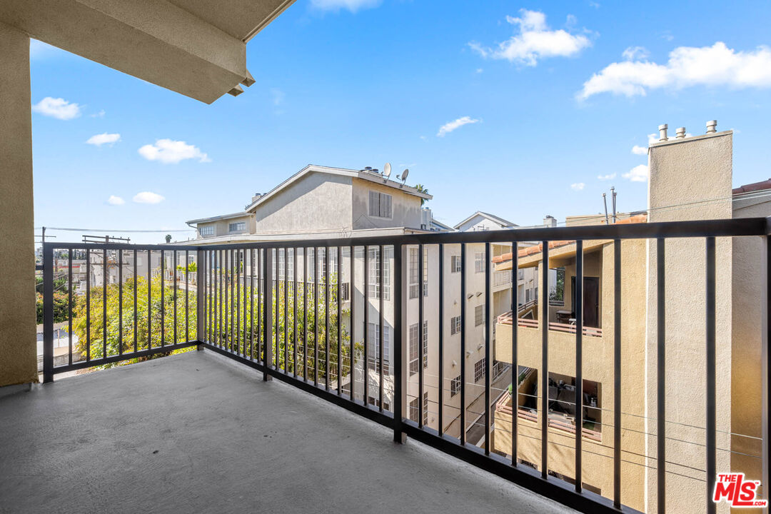 1215 South Bedford Street, Unit 105 Los Angeles, CA 90035 - Photo 23 of 27 a view of a balcony