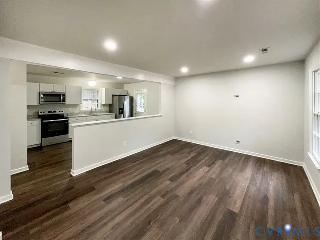 a view of a kitchen from the center