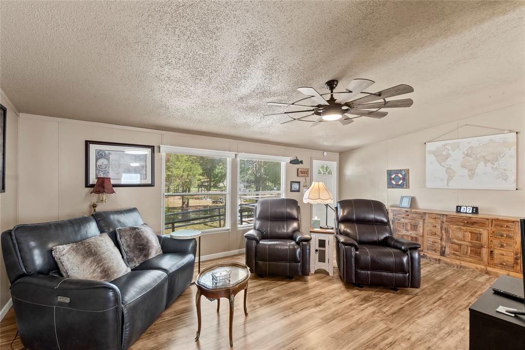 194 Indian Gap Road Mabank, TX 75156 - Photo 4 of 18 a living room with furniture and a large window