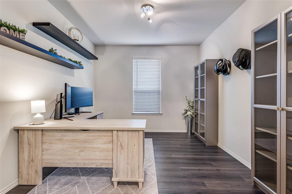 1810 Hummingbird Street Princeton, TX 75407 - Photo 15 of 25 a room with a walk in closet and a mirror