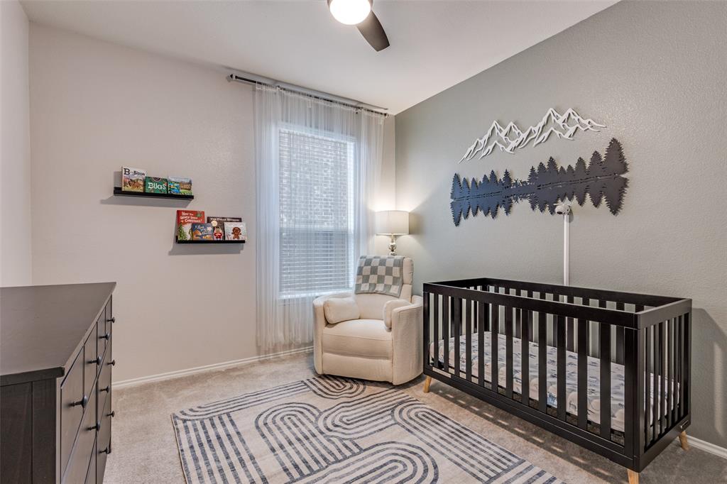1810 Hummingbird Street Princeton, TX 75407 - Photo 21 of 25 a bedroom with furniture and a window