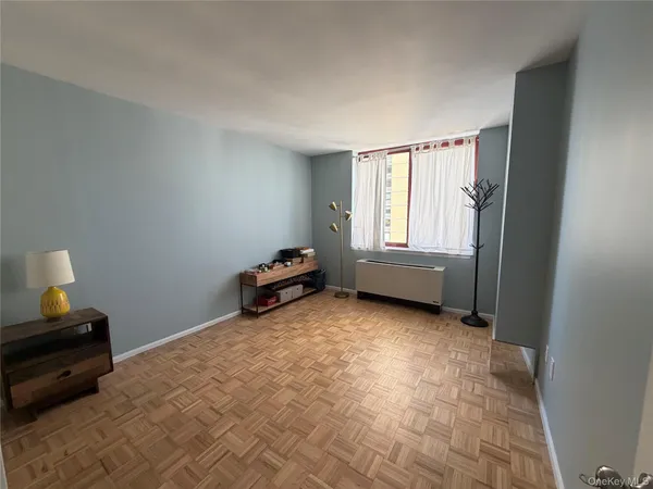 a view of room with window and closet