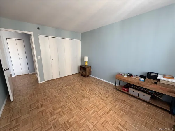a room with a bed and furniture