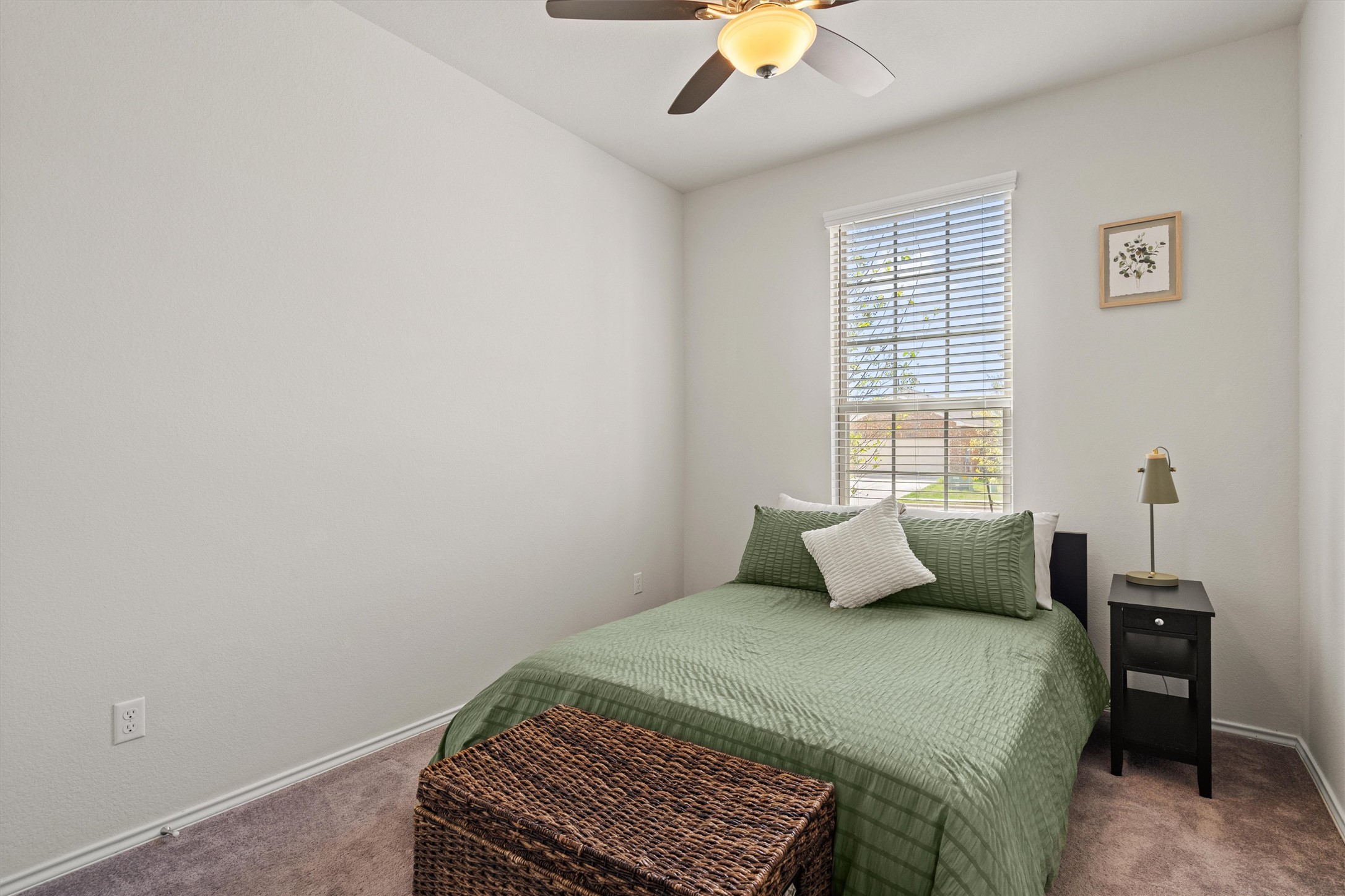 11816 Jackson Fls Way Manor, TX 78653 - Photo 16 of 40 a bedroom with a bed and a window