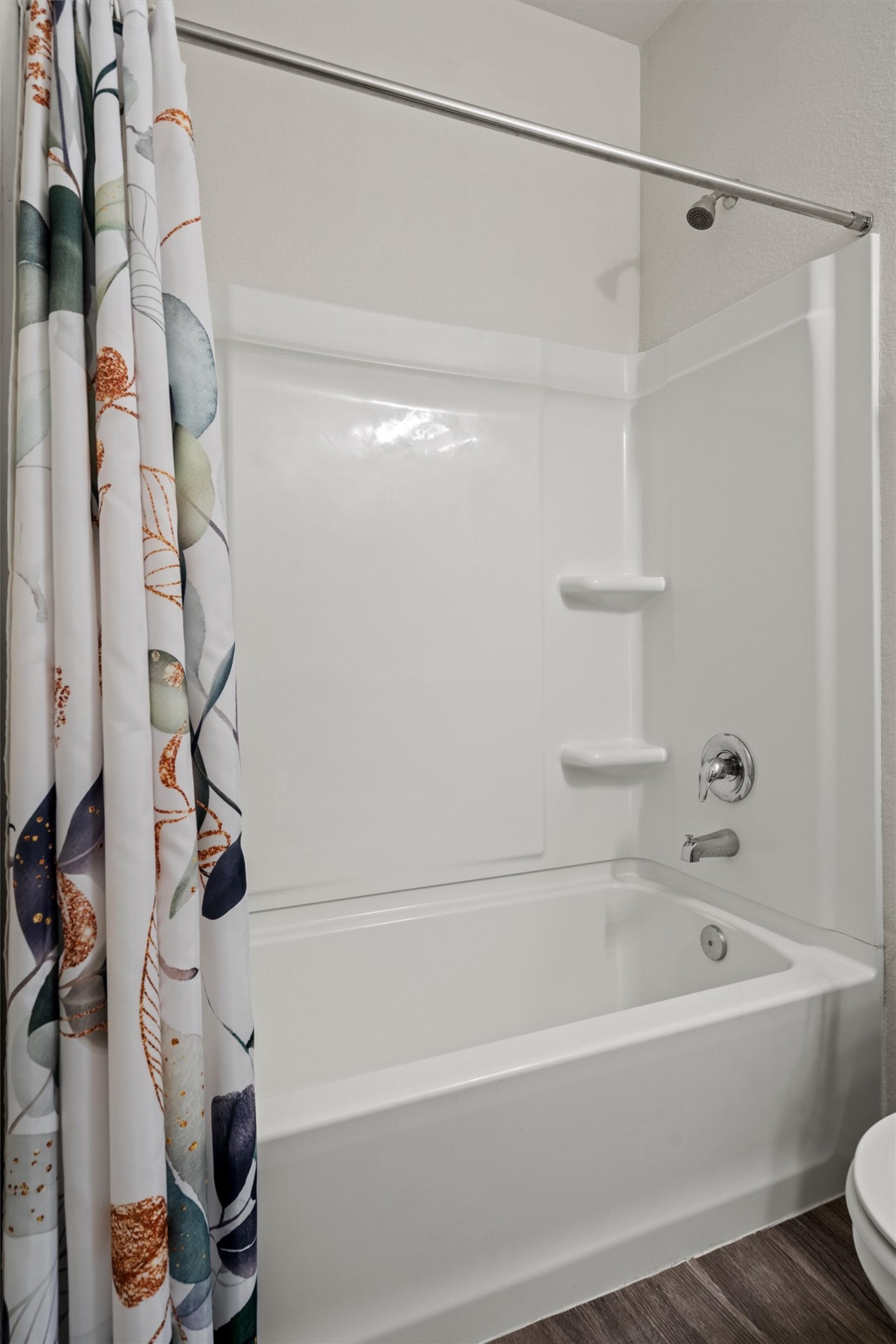 11816 Jackson Fls Way Manor, TX 78653 - Photo 19 of 40 a bathroom with a bathtub and a shower