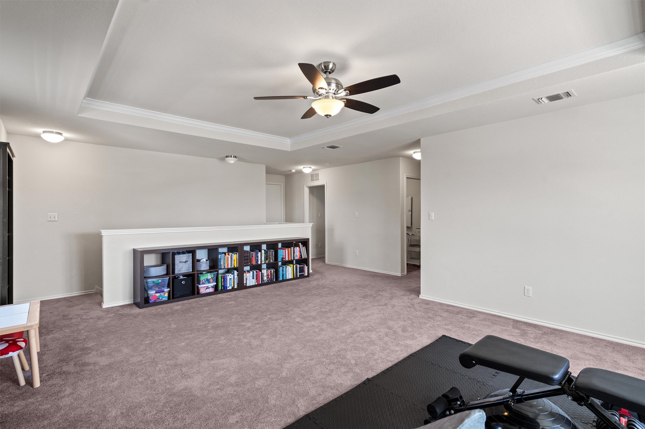 11816 Jackson Fls Way Manor, TX 78653 - Photo 22 of 40 a workspace with a ceiling fan and a window