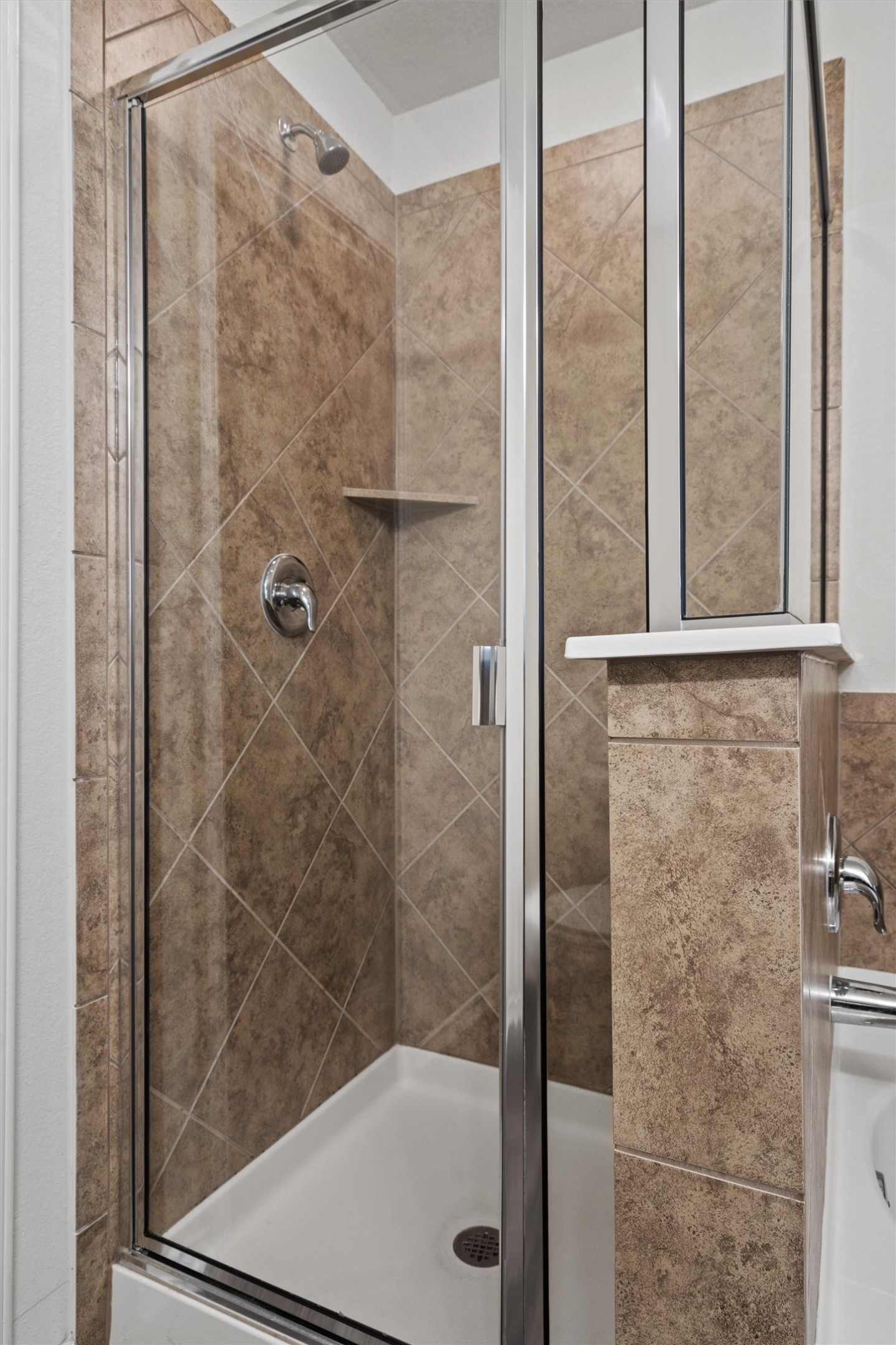 11816 Jackson Fls Way Manor, TX 78653 - Photo 27 of 40 a bathroom with a shower