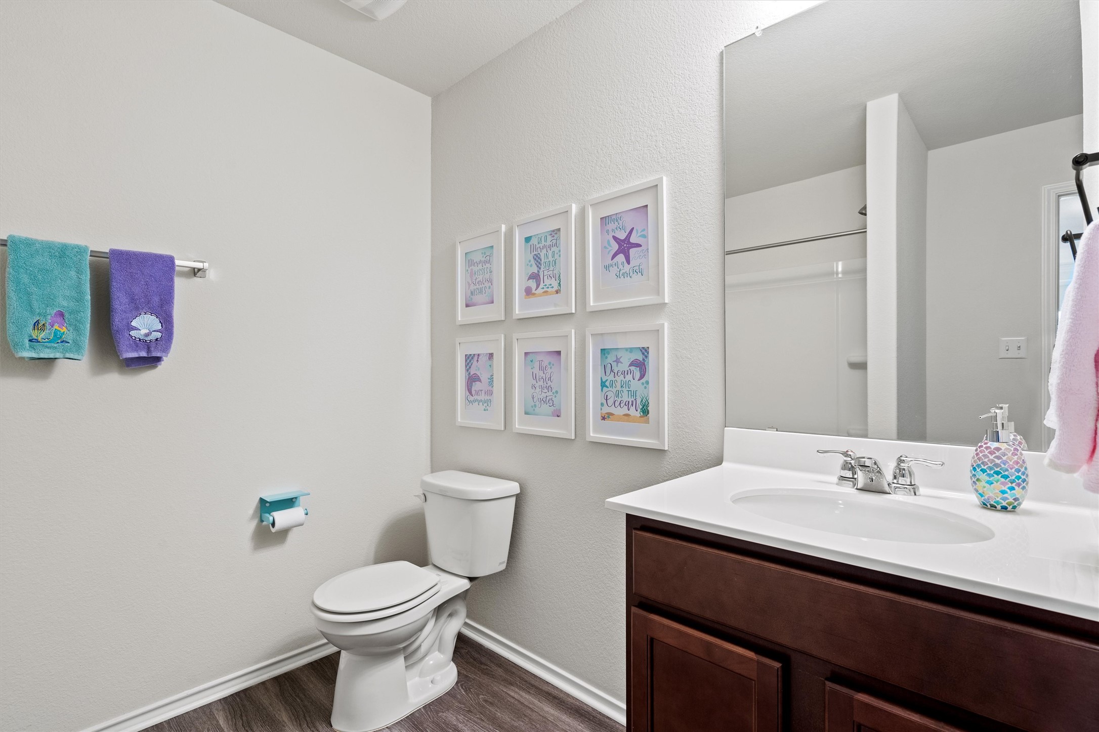 11816 Jackson Fls Way Manor, TX 78653 - Photo 32 of 40 a bathroom with a sink a toilet and shower