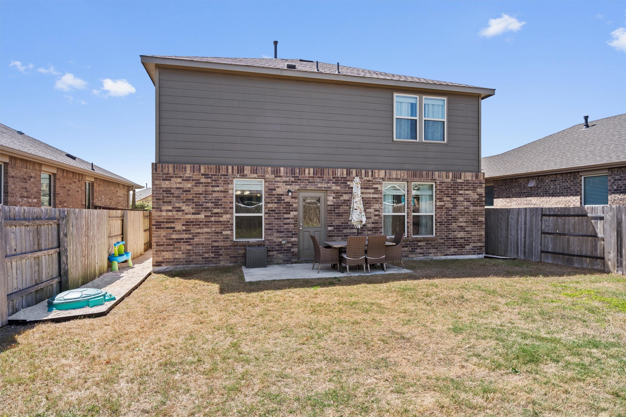 11816 Jackson Fls Way Manor, TX 78653 - Photo 35 of 40 a house view with a outdoor space