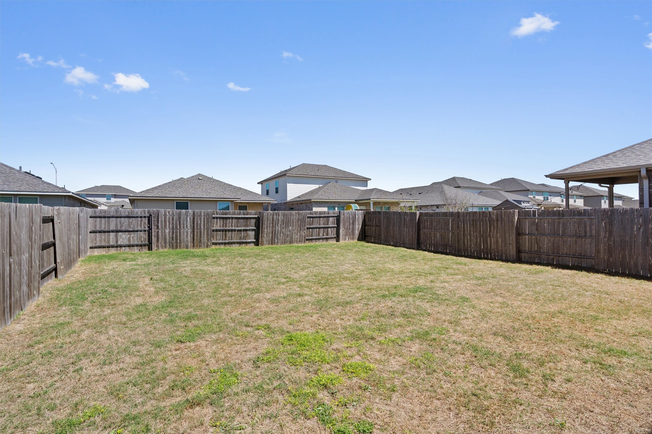 11816 Jackson Fls Way Manor, TX 78653 - Photo 37 of 40 a house view with a outdoor space