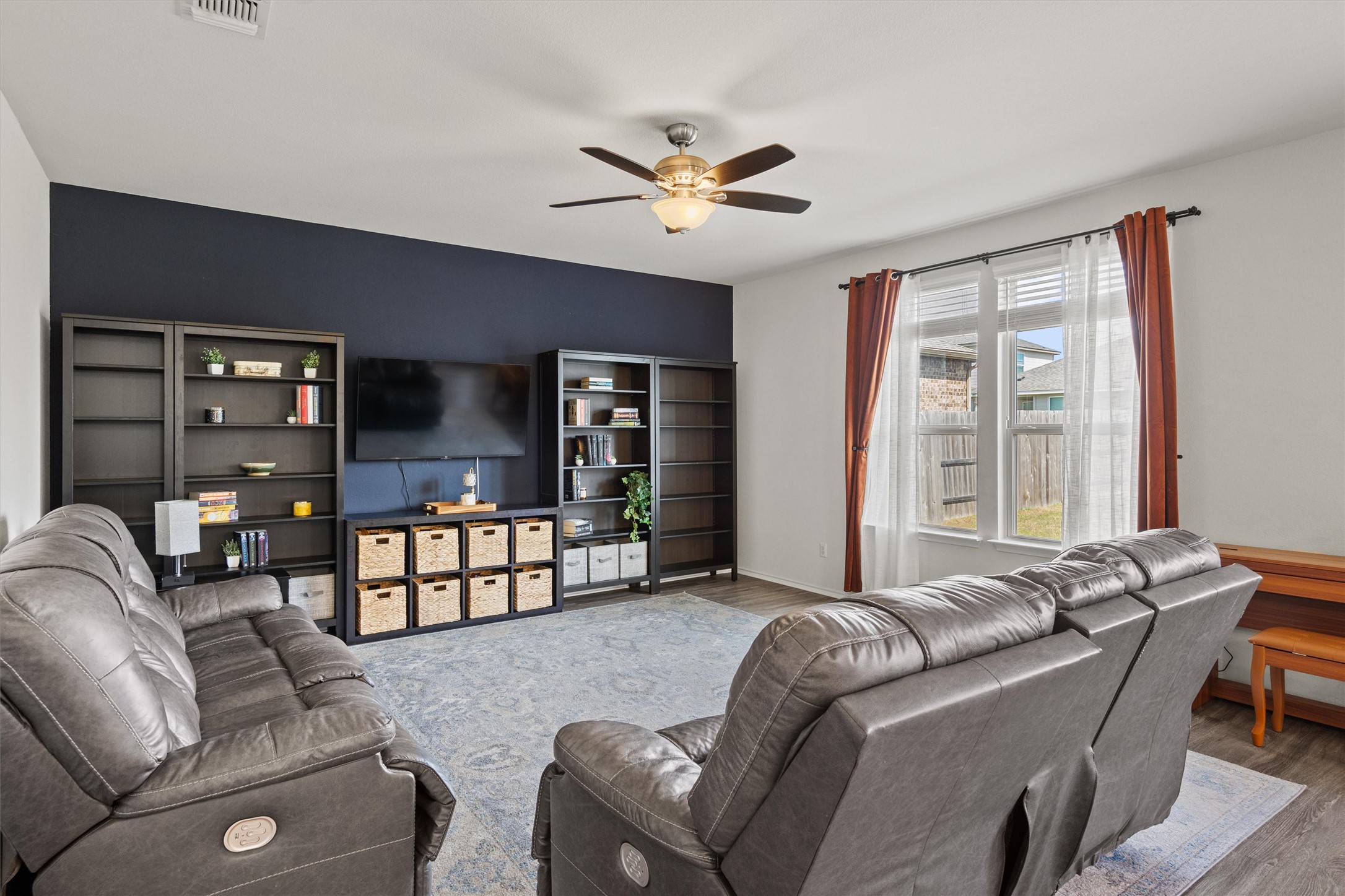 11816 Jackson Fls Way Manor, TX 78653 - Photo 7 of 40 a living room with furniture and a window