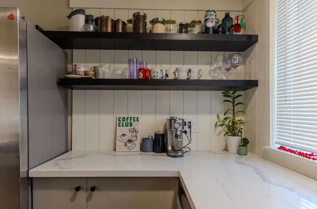 a table with wine bottles and on top of it