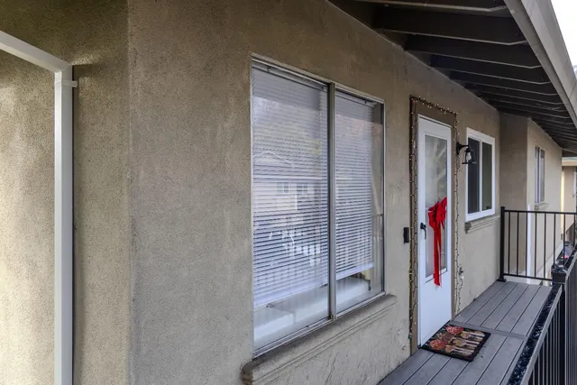 a view of livingroom with furniture and floor to ceiling window