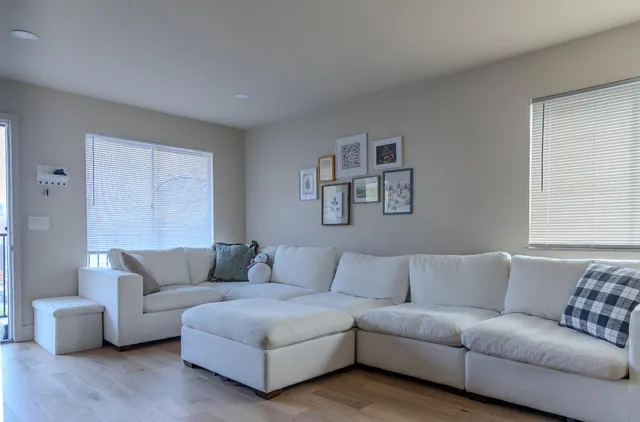 a living room with furniture and a couch