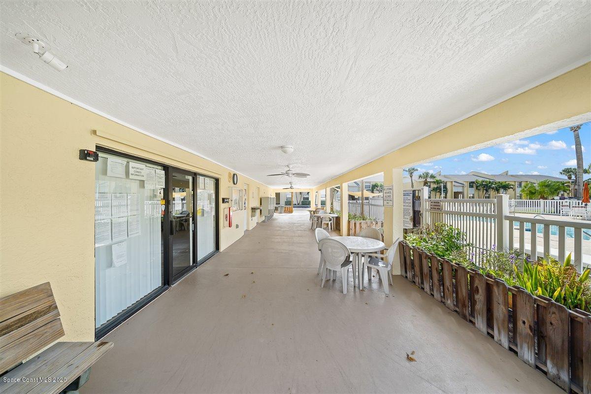 598 North Wickham Road, Unit 73 Melbourne, FL 32935 - Photo 22 of 33 Covered Lanai by pool
