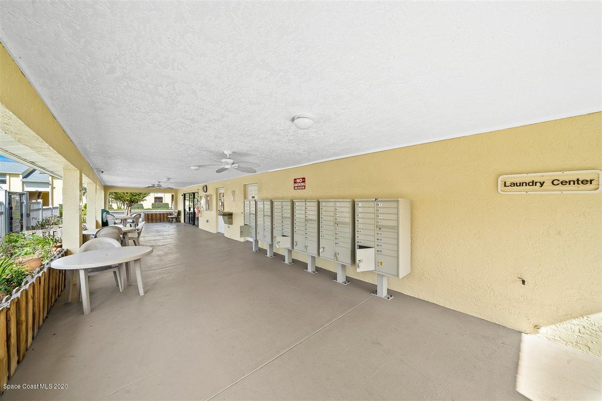598 North Wickham Road, Unit 73 Melbourne, FL 32935 - Photo 32 of 33 Area outside pool