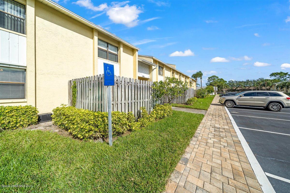 598 North Wickham Road, Unit 73 Melbourne, FL 32935 - Photo 8 of 33 Handicapped Ramp outside unit 73