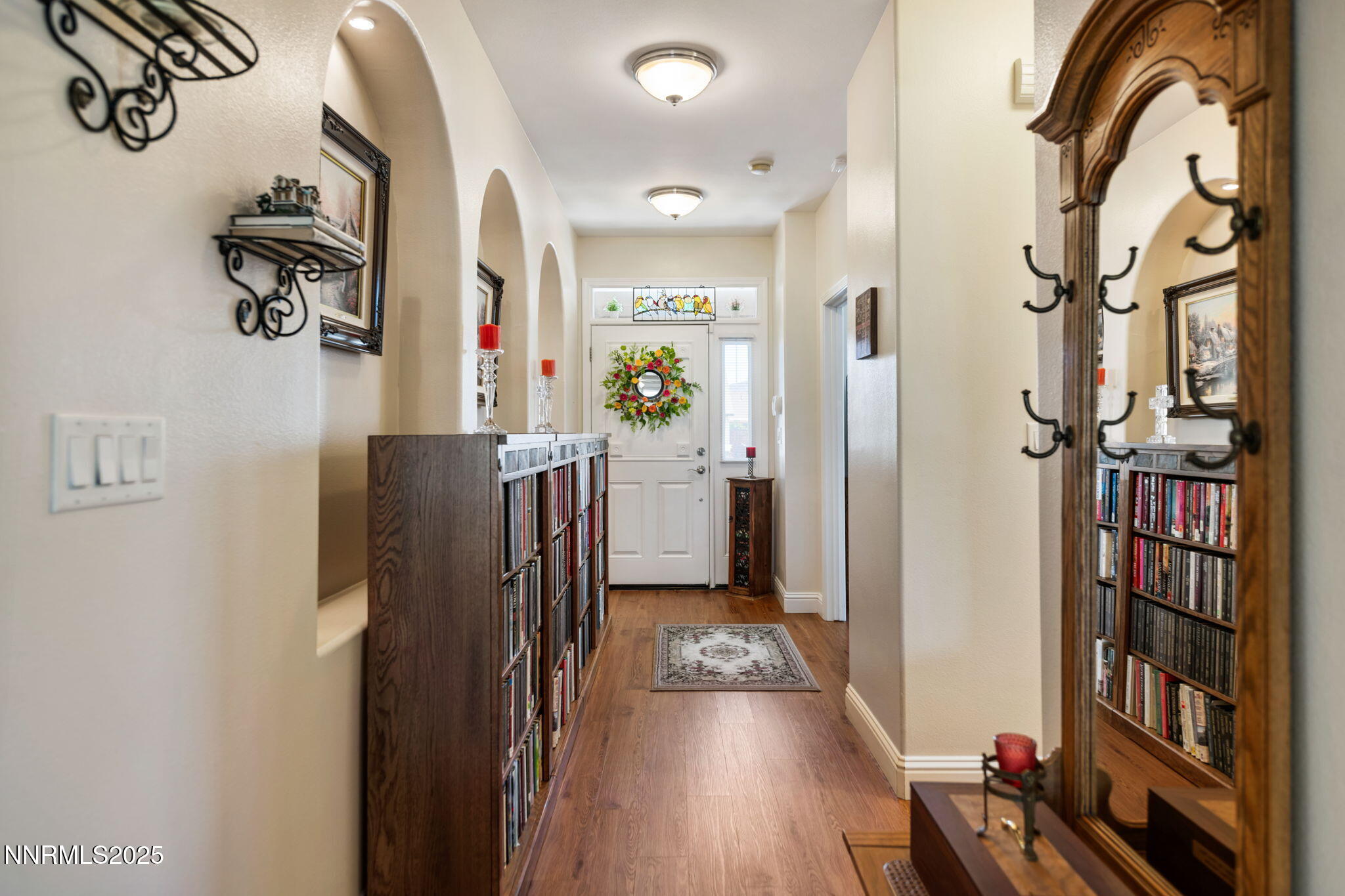112 Eagle Brook Lane Dayton, NV 89403 - Photo 13 of 48 a view of a hallway with wooden floor and entryway