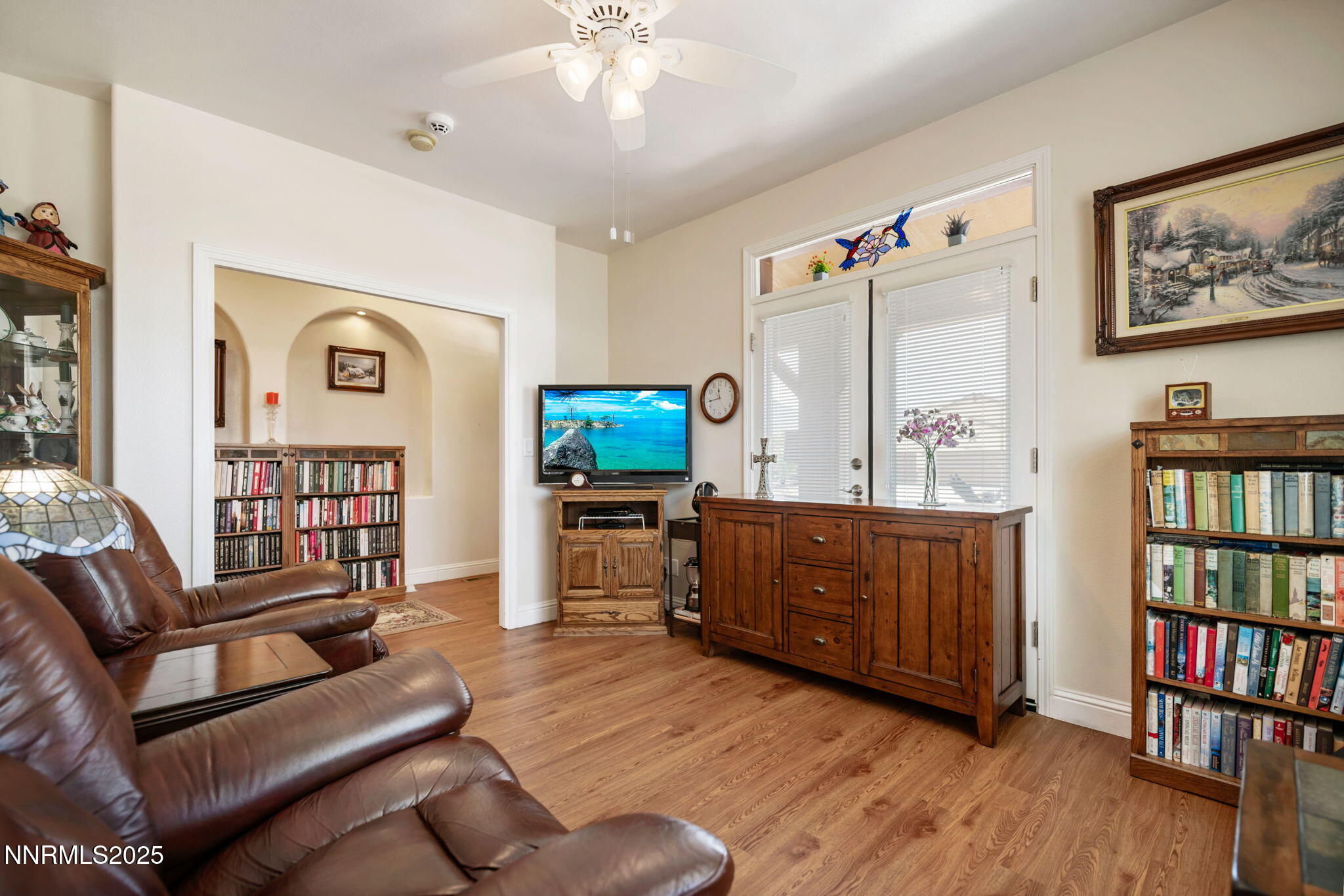 112 Eagle Brook Lane Dayton, NV 89403 - Photo 15 of 48 a living room with furniture and a book shelf