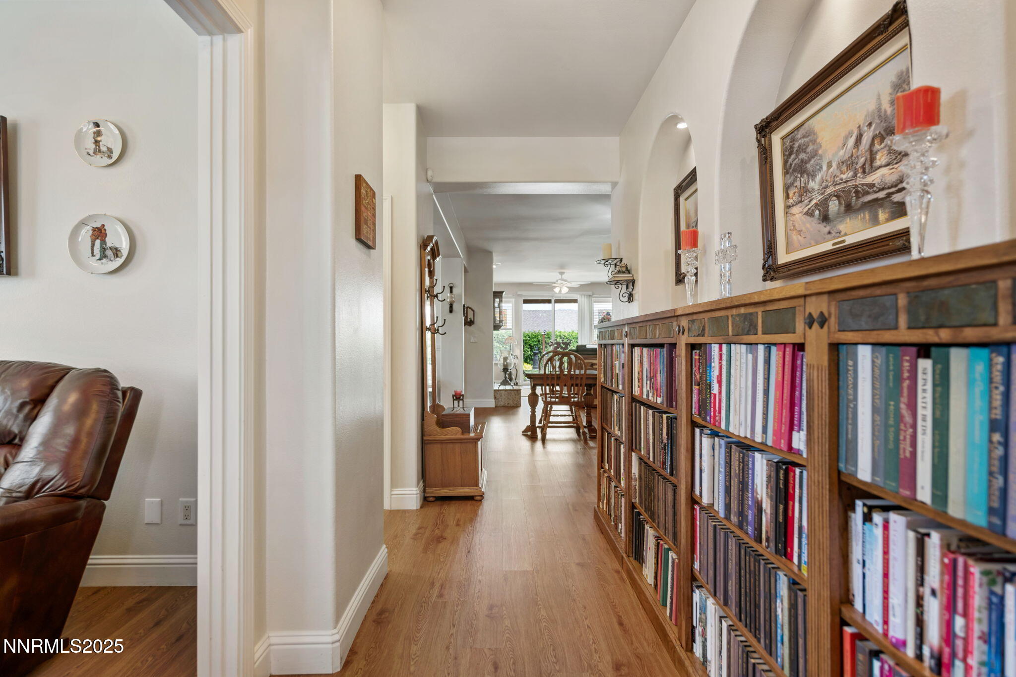 112 Eagle Brook Lane Dayton, NV 89403 - Photo 16 of 48 a view of a hallway with wooden floor and stairs